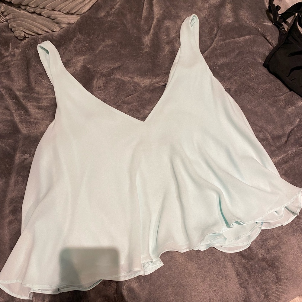 Baby blue blouse, very soft material, size M